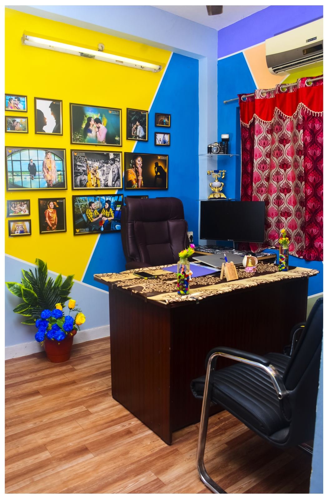 Premium office cabin with backlit mountain-themed wall art and camera decor